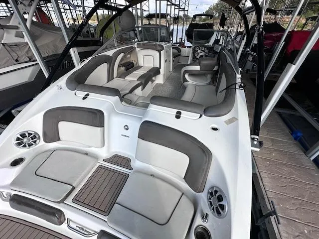 Slide: The Image of 2012 Yamaha Boats 242 Limited S interior with spacious seating and modern design. - 9