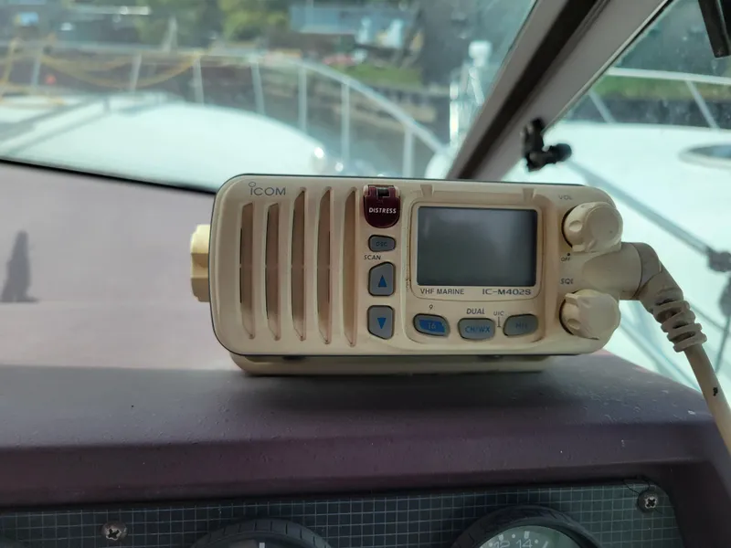 Slide: The Image of ICOM marine radio on 1989 Sea Ray 340 Sundancer dashboard. - 14