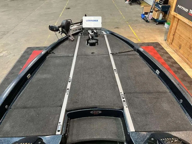 Slide: The Image of 2008 Ranger Z21 boat deck with Lowrance equipment in a workshop setting. - 7