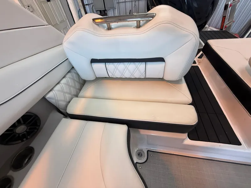 Slide: The Image of Luxurious seating in the 2024 Regal LX2 boat, featuring elegant white upholstery and modern design. - 17