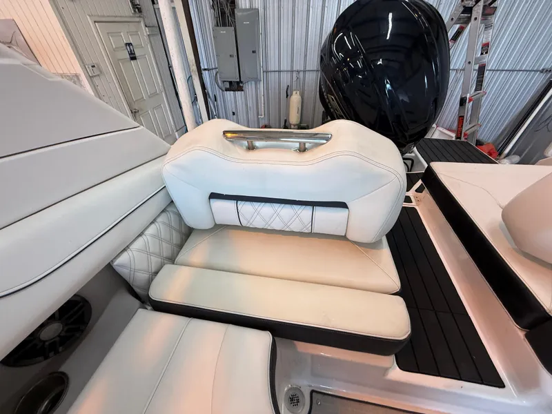 Slide: The Image of 2024 Regal LX2 boat interior with luxurious white seating and modern design. - 18