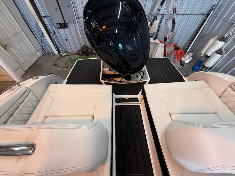 Slide: The Image of 2024 Regal LX2 boat interior with sleek seating and modern design. - 28