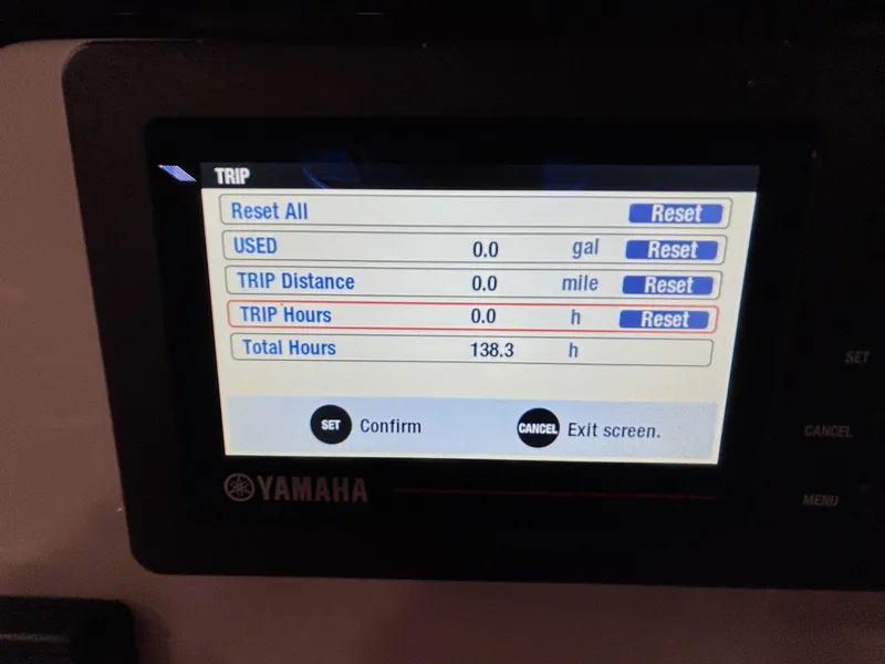 Slide: The Image of Yamaha display showing trip settings and total hours for 2019 Sailfish 241 CC boat. - 24