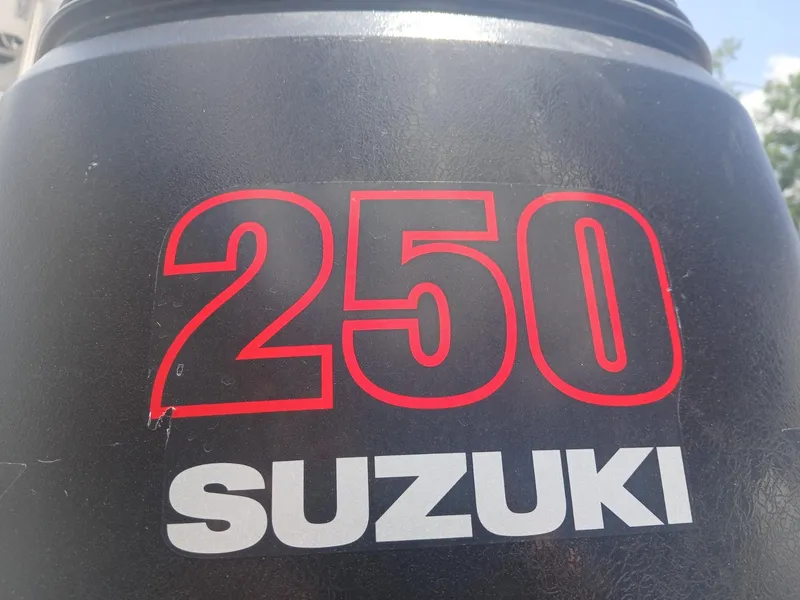 Slide: The Image of Close-up of Suzuki 250 outboard motor on 2007 NauticStar 22 CC OS boat. - 11