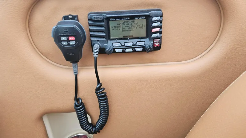 Slide: The Image of VHF radio system on 2013 Chris-Craft Launch 32 boat dashboard. - 19