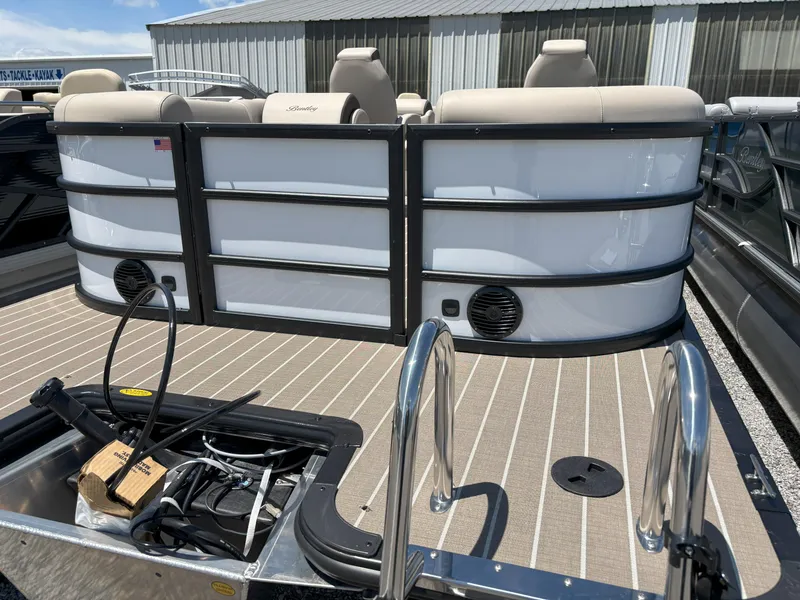 Slide: The Image of 2025 Bentley Pontoons Legacy 223 Navigator, rear view with seating and deck details. - 12