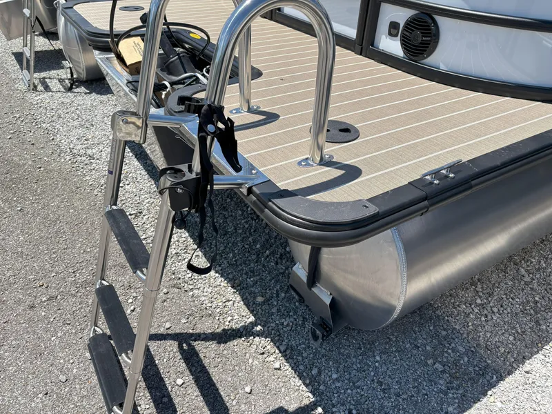 Slide: The Image of 2025 Bentley Pontoons Legacy 223 Navigator with ladder and deck detail. - 13
