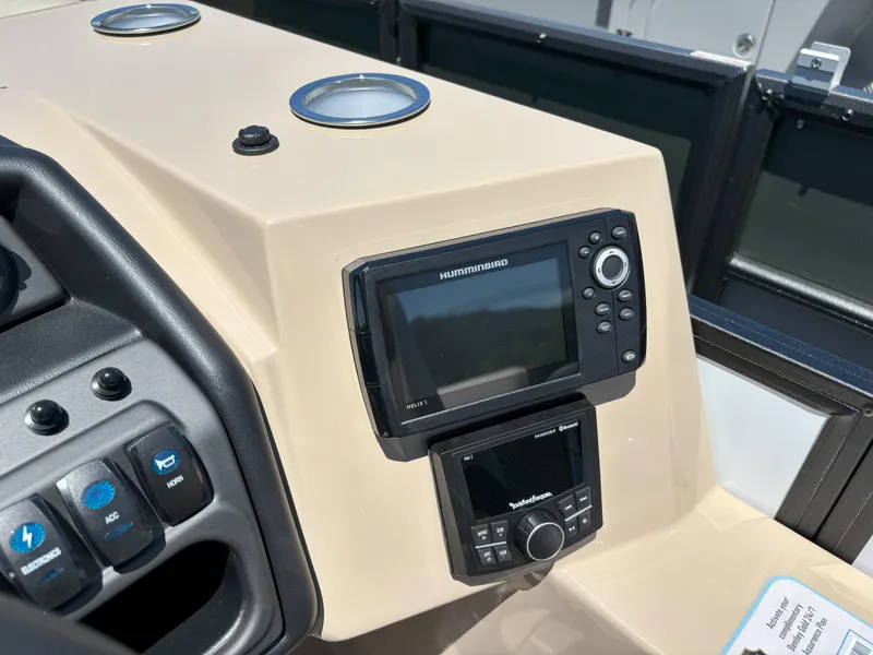 Slide: The Image of Control panel of 2025 Bentley Pontoons Legacy 223 Navigator with navigation and audio systems. - 7