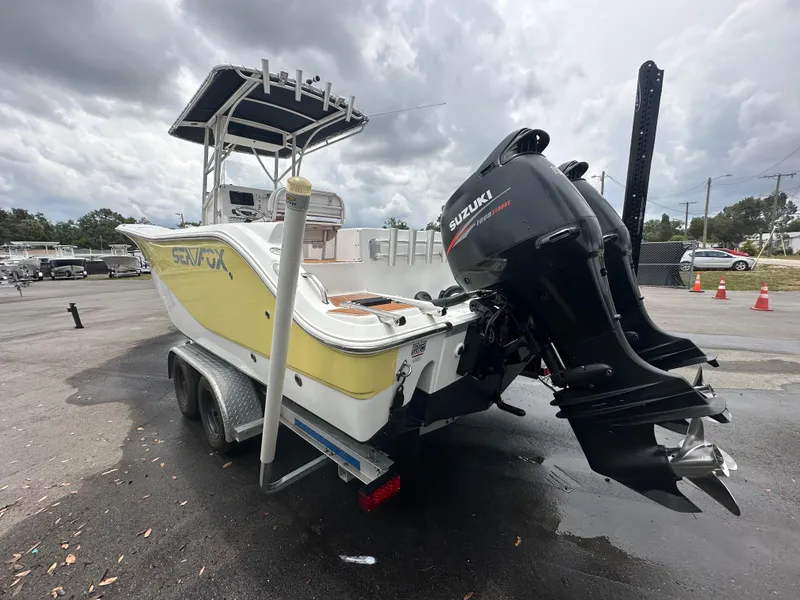 Slide: The Image of 2007 Sea Fox 256 CC boat with Suzuki outboard motor on trailer. - 9