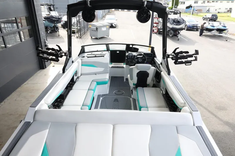 Slide: The Image of 2023 Axis T220 boat interior with spacious seating and modern design. - 10