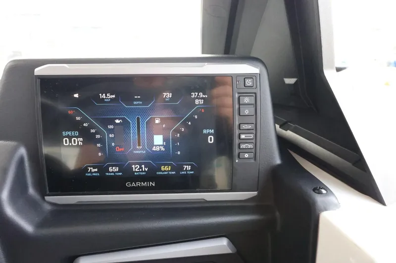 Slide: The Image of Dashboard of 2023 Axis T220 boat with Garmin display showing speed and RPM. - 24