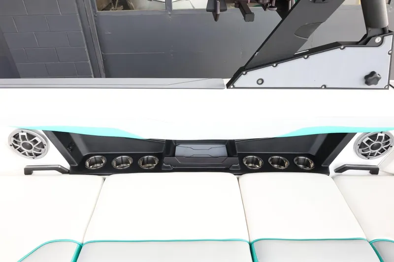 Slide: The Image of 2023 Axis T220 boat interior with speakers and cup holders. - 43