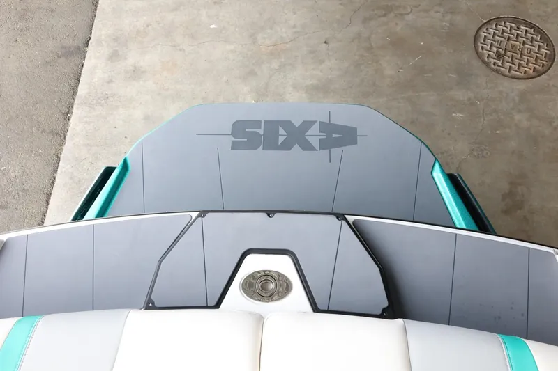 Slide: The Image of 2023 Axis T220 boat swim platform with "SIX" logo, featuring teal accents. - 44