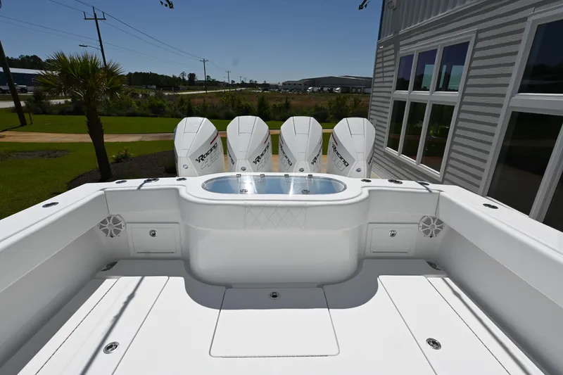 Slide: The Image of 2022 Onslow Bay 41 boat deck with four powerful outboard engines. - 6