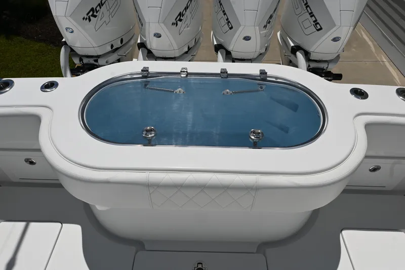 Slide: The Image of 2022 Onslow Bay 41 boat with livewell and powerful outboard engines. - 7