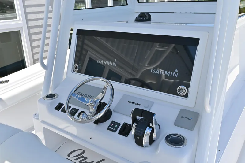 Slide: The Image of Onslow Bay 41 boat dashboard with Garmin navigation, 2022 model. - 9