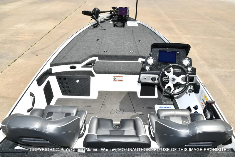 Slide: The Image of 2024 Nitro Z20 Pro boat interior with steering console and seating. - 10