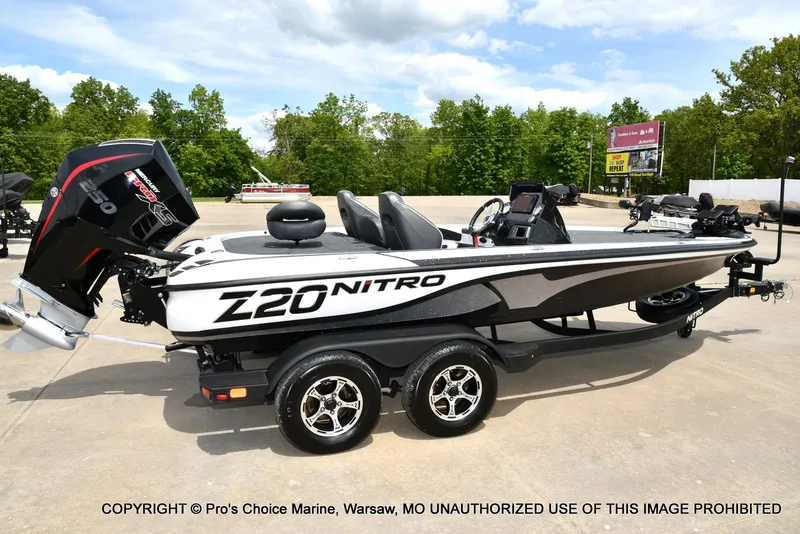 Slide: The Image of 2024 Nitro Z20 Pro boat on trailer, featuring sleek design and powerful engine. - 19