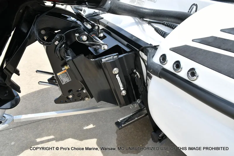 Slide: The Image of 2024 Nitro Z20 Pro boat engine mount detail with hydraulic components. - 21