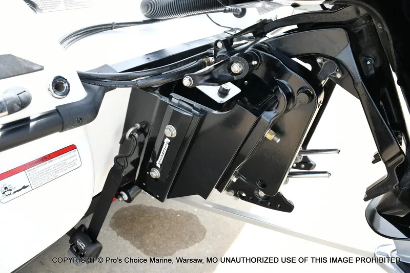 Slide: The Image of 2024 Nitro Z20 Pro boat engine mount detail with hydraulic components. - 24