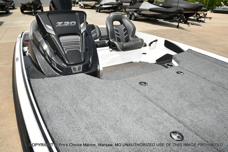 Slide: The Image of 2024 Nitro Z20 Pro boat interior with sleek seating and spacious deck. - 37