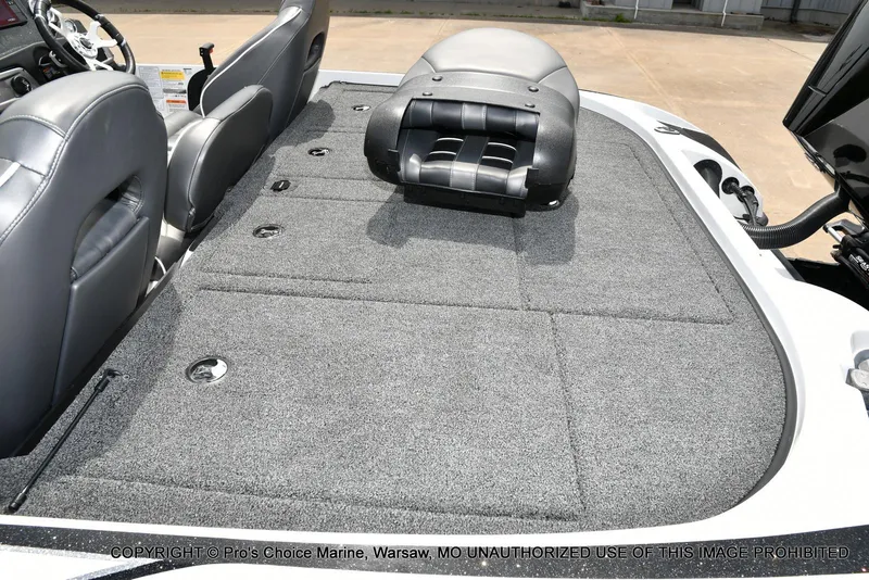 Slide: The Image of 2024 Nitro Z20 Pro boat interior with gray carpet and seating. - 41