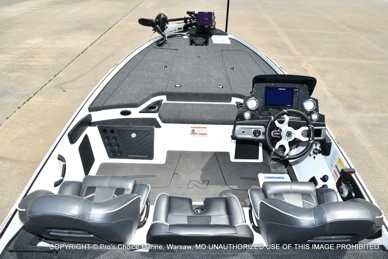Slide: The Image of 2024 Nitro Z20 Pro boat interior with steering console and seating. - 42