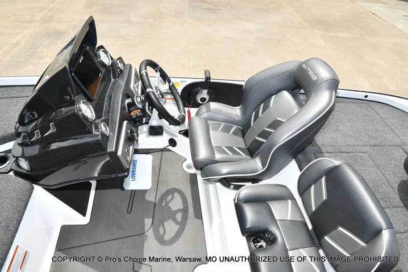 Slide: The Image of 2024 Nitro Z20 Pro boat interior with sleek dashboard and comfortable seating. - 44