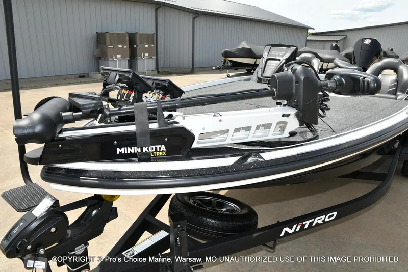 Slide: The Image of 2024 Nitro Z20 Pro boat with Minn Kota Ultrex trolling motor on trailer. - 5