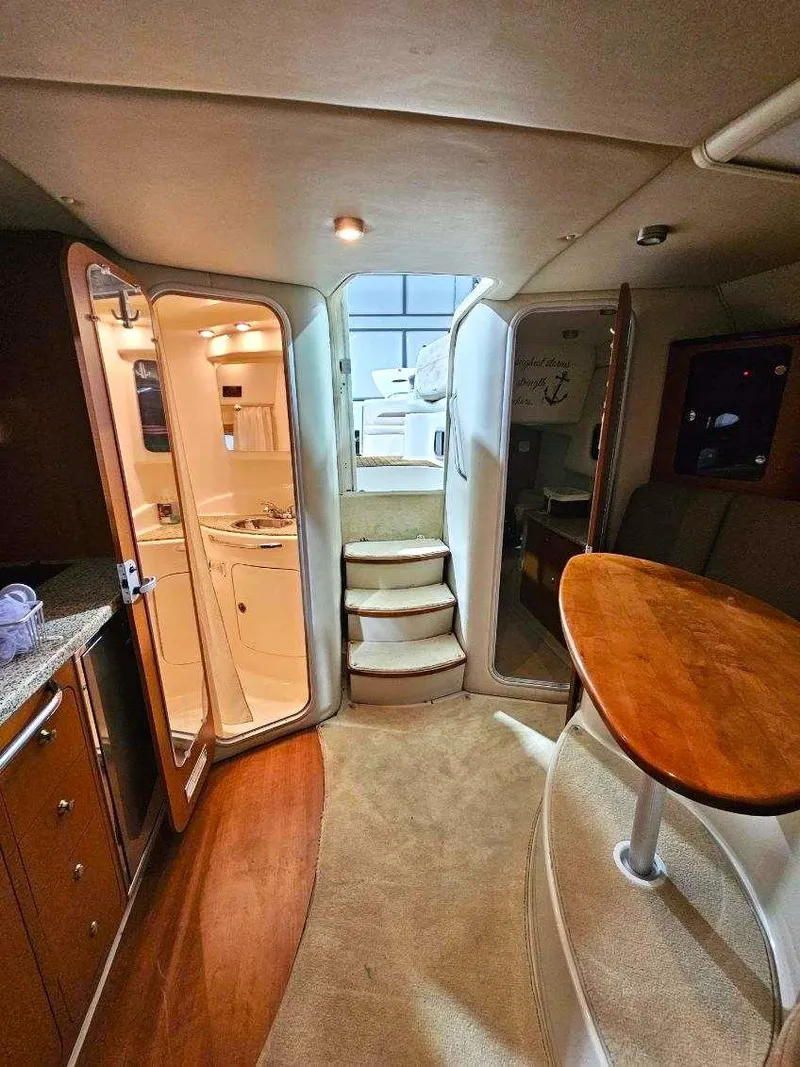 Slide: The Image of Interior of 2005 Chaparral Signature 330 yacht with modern amenities and elegant design. - 10