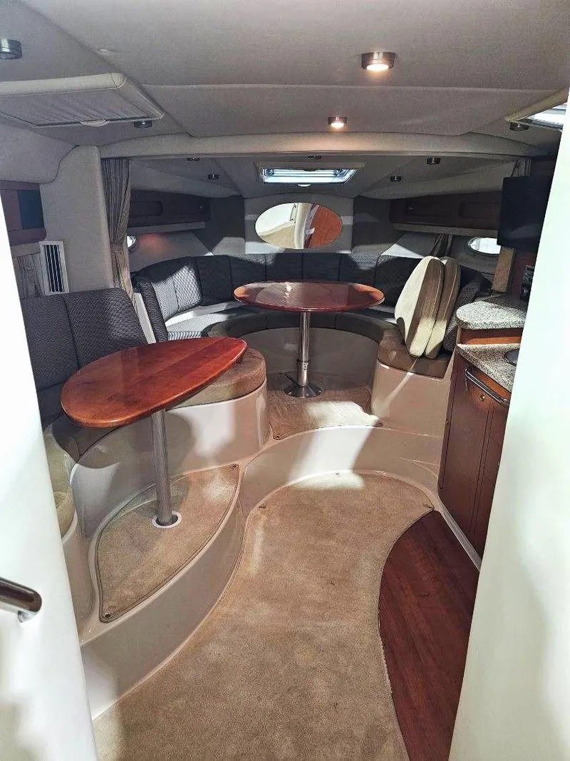 Slide: The Image of 2005 Chaparral Signature 330 interior with dining area and seating. - 13