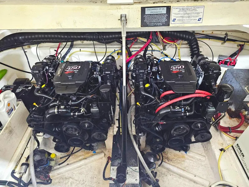 Slide: The Image of Twin engines in a 2005 Chaparral Signature 330 boat engine compartment. - 9