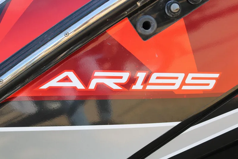 Slide: The Image of 2018 Yamaha Boats AR 195 logo on a sleek, red and black design. - 15
