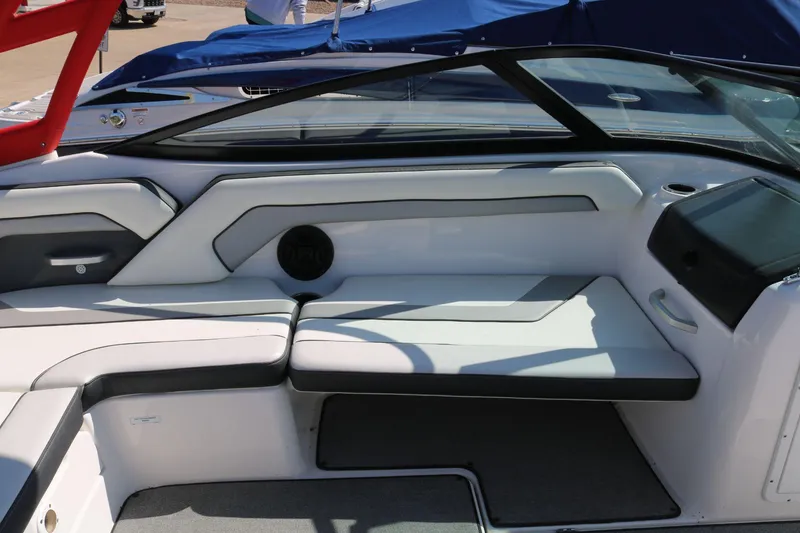 Slide: The Image of 2018 Yamaha Boats AR 195 interior seating with sleek design and comfortable upholstery. - 8