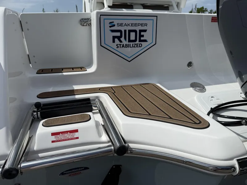 Slide: The Image of 2025 Tidewater 232 CC Adventure boat with Seakeeper Ride stabilization system. - 5