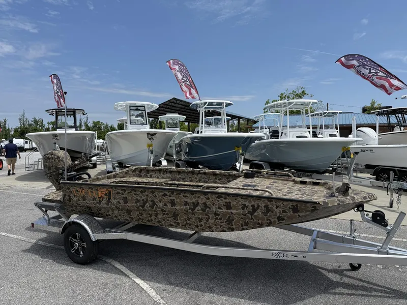 Slide: The Image of 2025 Excel Viper F4 1751-YAMHA 60 boat on trailer, camo design, outdoor display. - 1