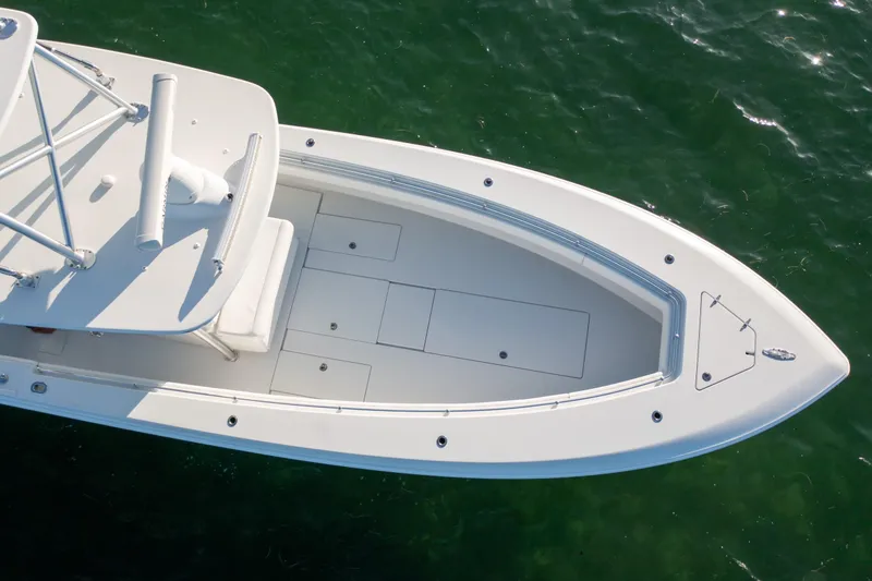 Slide: The Image of 2018 Contender 39 ST boat, aerial view, on green water. - 14