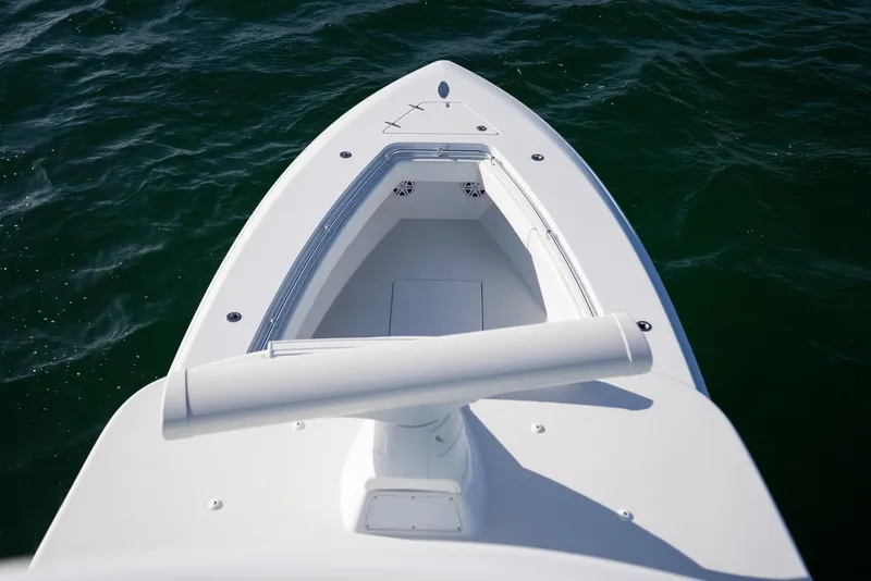 Slide: The Image of Bow view of 2018 Contender 39 ST boat on water. - 15