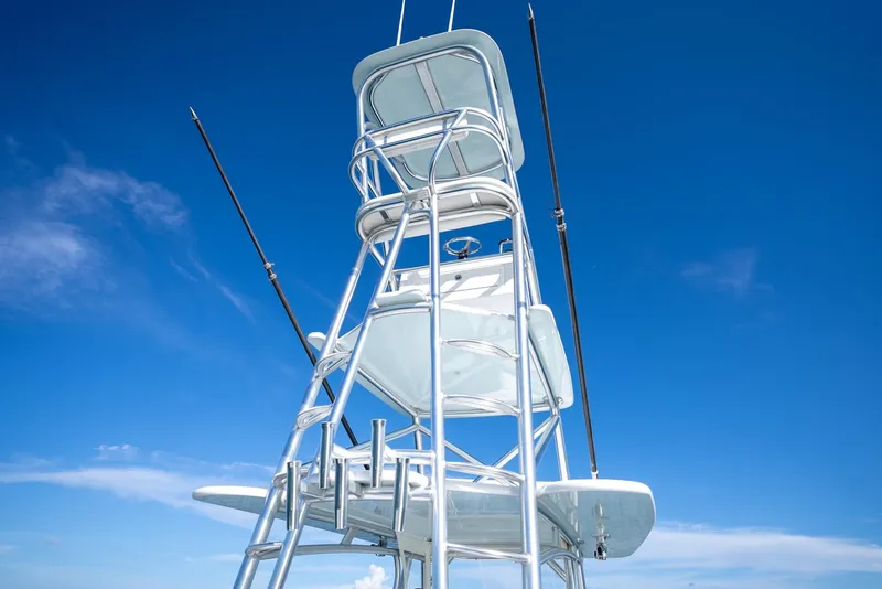 Slide: The Image of Tower of 2018 Contender 39 ST boat against clear blue sky. - 26