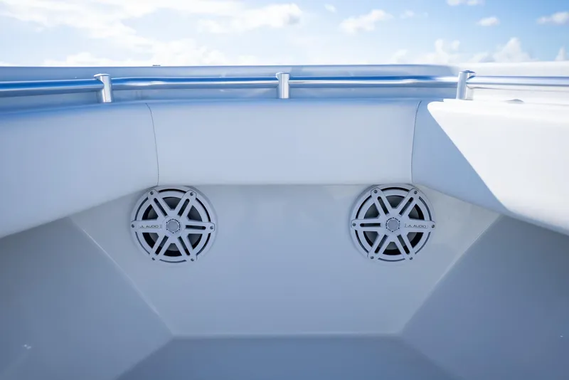 Slide: The Image of 2018 Contender 39 ST boat speakers with sleek design against a clear sky backdrop. - 29