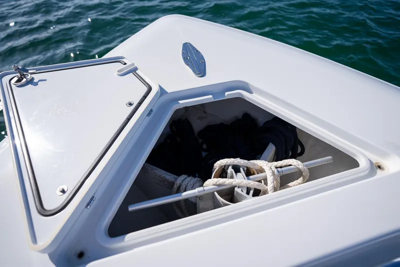 Slide: The Image of Open anchor locker on 2018 Contender 39 ST boat with ropes inside. - 31