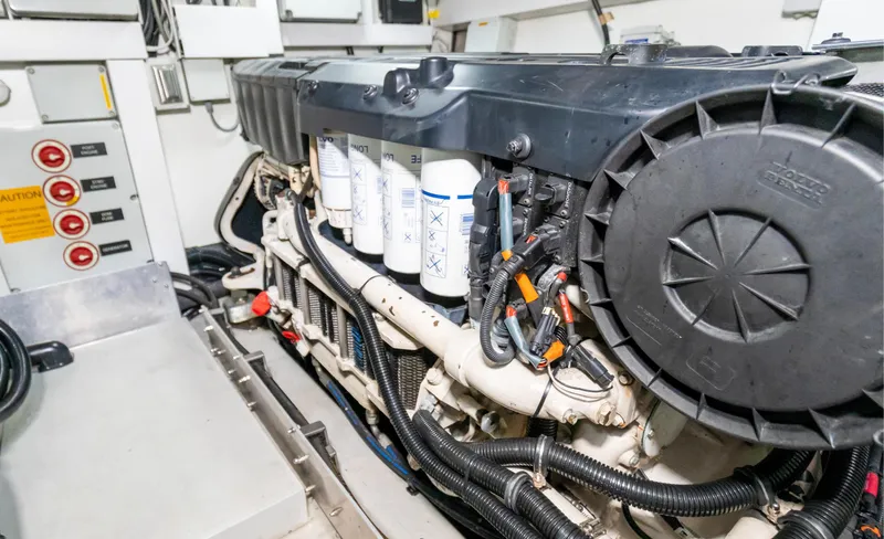 Slide: The Image of Engine room of 2016 Sunseeker Manhattan 55 yacht, showcasing detailed machinery and components. - 106