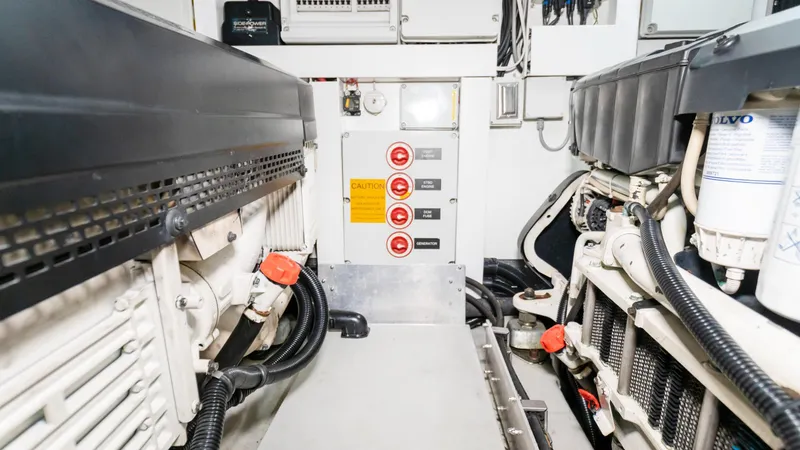 Slide: The Image of Engine room of 2016 Sunseeker Manhattan 55 yacht, featuring mechanical components and control panel. - 107