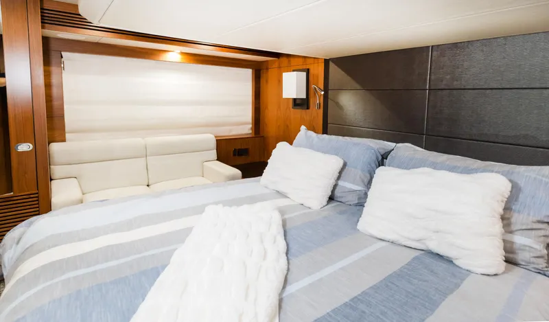 Slide: The Image of Luxurious bedroom interior of 2016 Sunseeker Manhattan 55 yacht with cozy bedding. - 25