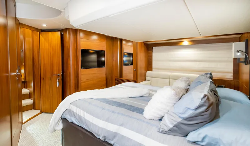 Slide: The Image of Luxurious bedroom interior of 2016 Sunseeker Manhattan 55 yacht with modern wood finishes. - 27