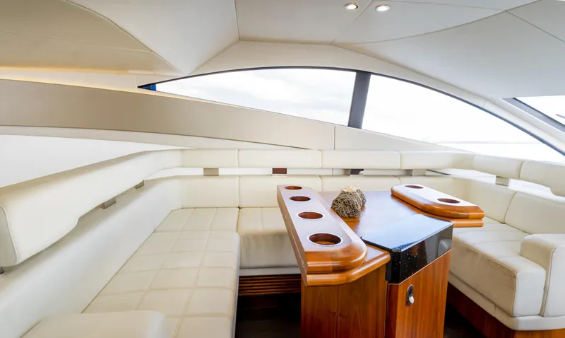 Slide: The Image of Luxurious interior of 2016 Sunseeker Manhattan 55 yacht with elegant seating and wooden table. - 40