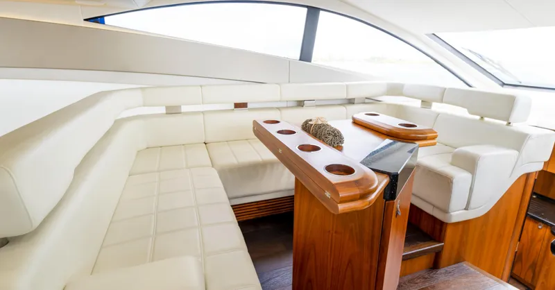 Slide: The Image of Luxurious interior of 2016 Sunseeker Manhattan 55 yacht with elegant seating and wooden accents. - 49
