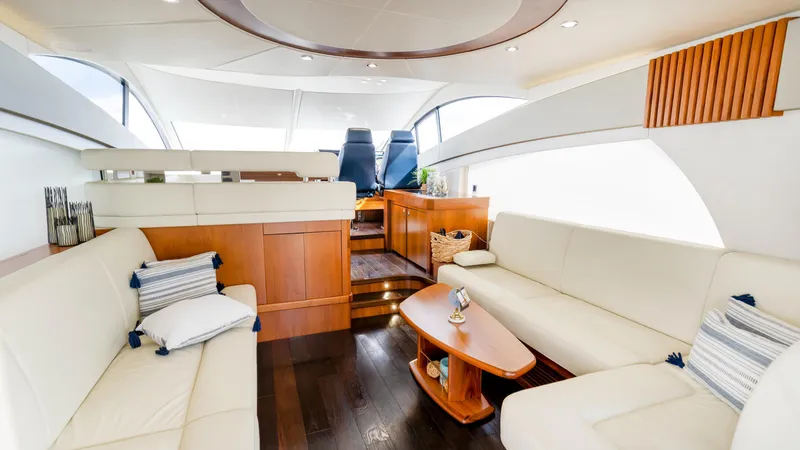 Slide: The Image of Luxurious interior of 2016 Sunseeker Manhattan 55 yacht with elegant seating and wooden accents. - 54