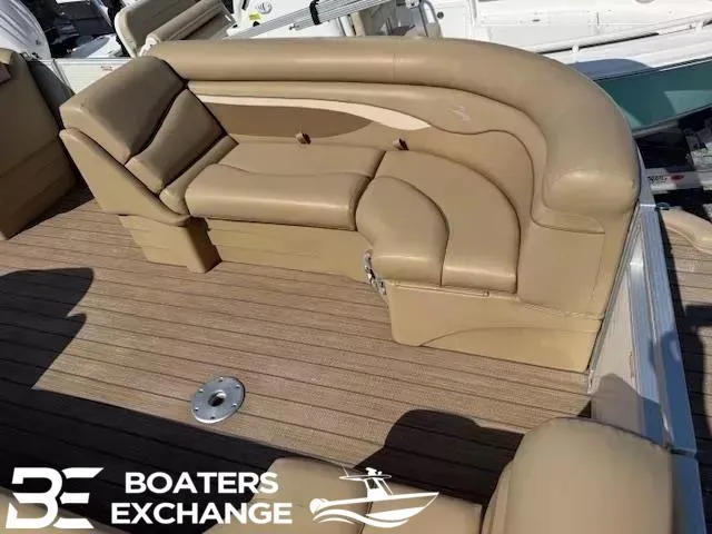 Slide: The Image of 2017 Bennington 21SLX boat with tan seating and wood deck at Boaters Exchange. - 10