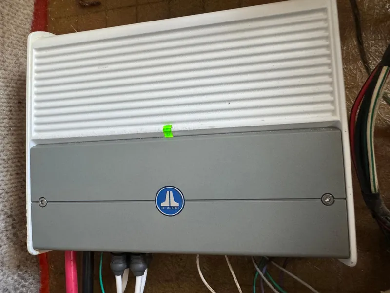 Slide: The Image of JL Audio amplifier installed on a 2005 Sea Fox 287 Center Console boat. - 6